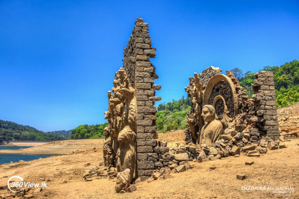 Sculptured Buddha Statues Emerged in dry season Kotmale in 2016