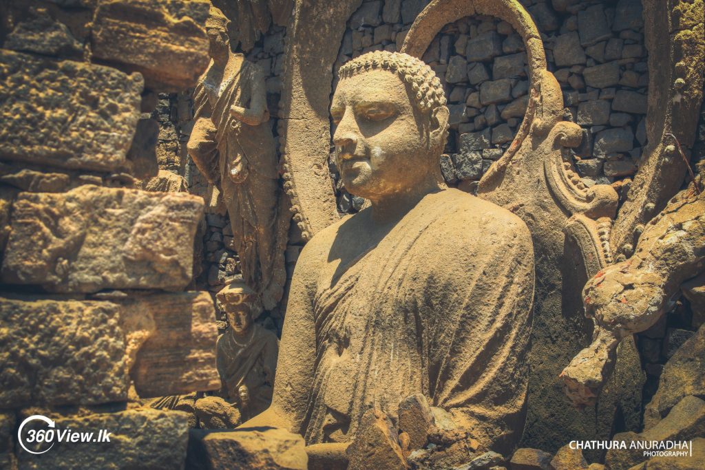 Closeup shot of Sculptured Buddha Statues Emerged in dry season Kotmale in 2016